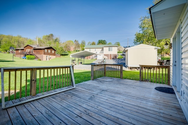 467 Thru Dr, Pounding Mill, VA 24637 - wooden deck featuring a lawn, a residential view, and an outbuilding