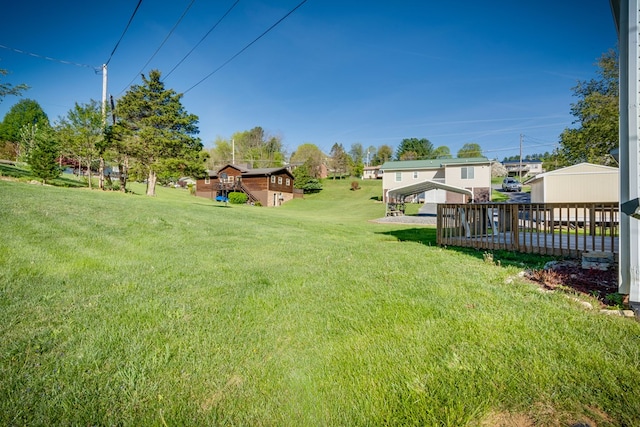 467 Thru Dr, Pounding Mill, VA 24637 - view of grassy yard featuring a deck and a residential view