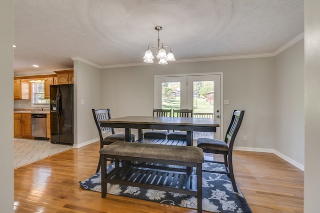 467 Thru Dr, Pounding Mill, VA 24637 - dining space featuring light wood finished floors, ornamental molding, a chandelier, a textured ceiling, and recessed lighting