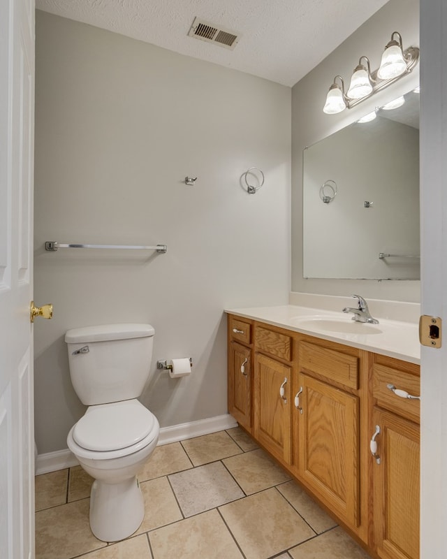 467 Thru Dr, Pounding Mill, VA 24637 - bathroom with vanity, tile patterned flooring, and a textured ceiling