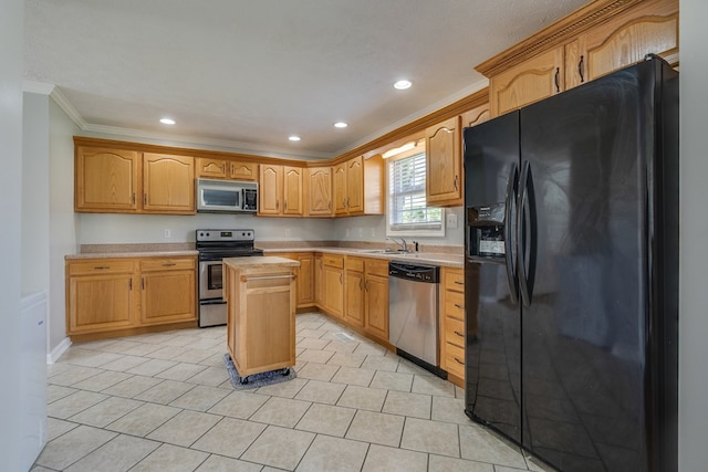 467 Thru Dr, Pounding Mill, VA 24637 - kitchen with stainless steel appliances, ornamental molding, light countertops, recessed lighting, and a center island