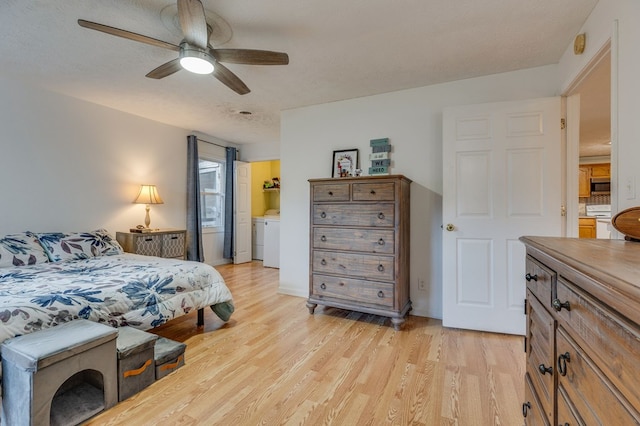 bedroom with light wood-type flooring and ceiling fan