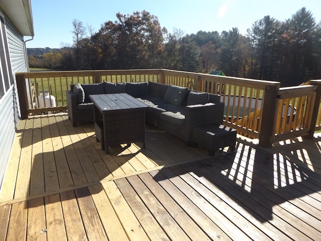 deck featuring an outdoor living space