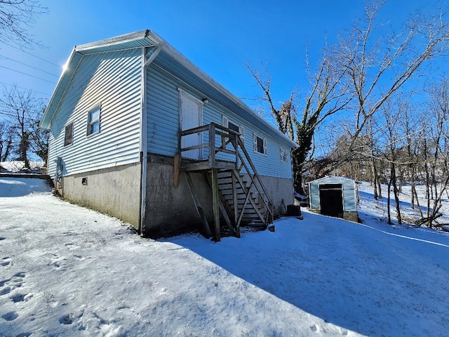 200 Fries Rd, Galax, VA 24333 - snow covered rear of property featuring a storage unit