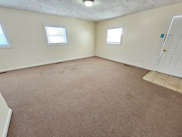 200 Fries Rd, Galax, VA 24333 - carpeted empty room with baseboards