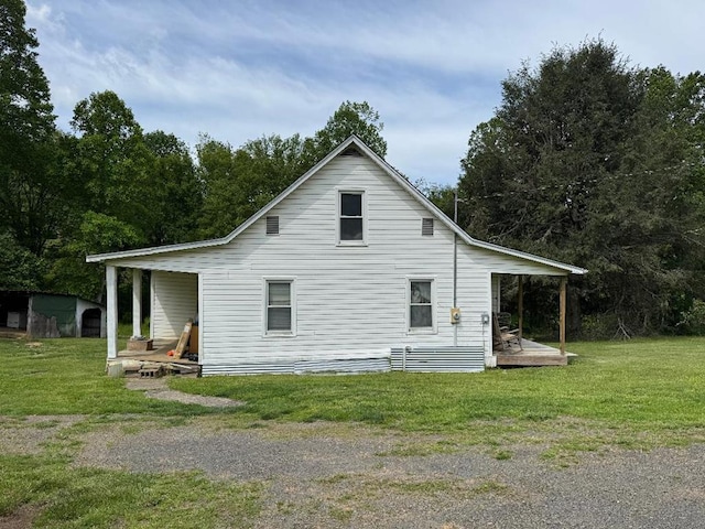 402 Dickerson Rd, Willis, VA 24343 - back of property featuring a lawn