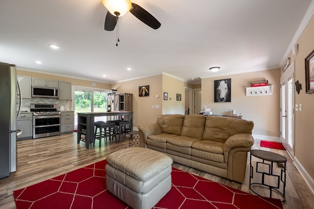 1610 Pope Rd, Ivanhoe, VA 24350 - living area featuring wood finished floors, ornamental molding, ceiling fan, and recessed lighting