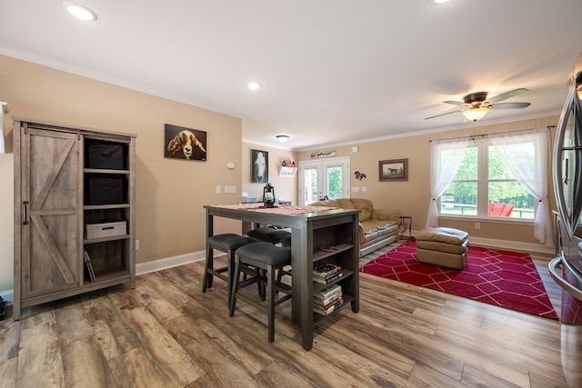 1610 Pope Rd, Ivanhoe, VA 24350 - dining space with ornamental molding, wood finished floors, a barn door, recessed lighting, and ceiling fan
