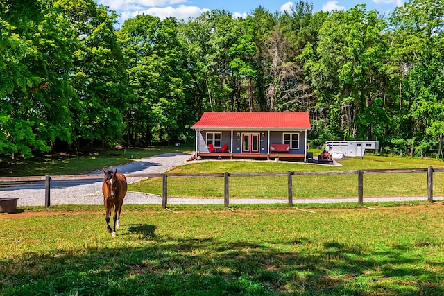 1610 Pope Rd, Ivanhoe, VA 24350 - view of front of house with a metal roof, french doors, gravel driveway, and a porch