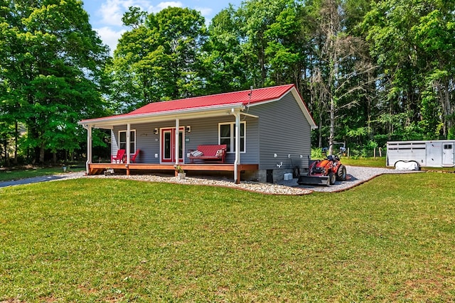 1610 Pope Rd, Ivanhoe, VA 24350 - ranch-style house with covered porch, a front lawn, and a metal roof