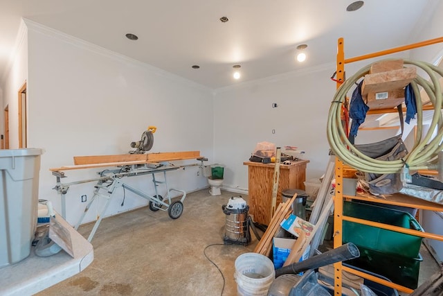 misc room with concrete floors and crown molding