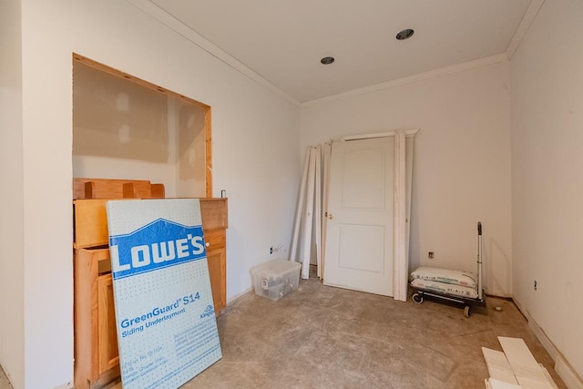 interior space with unfinished concrete flooring and crown molding