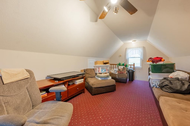 living area with vaulted ceiling, carpet floors, and a ceiling fan