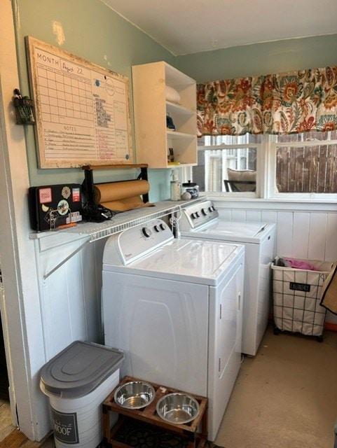 washroom featuring washer and clothes dryer