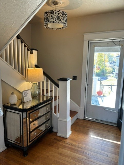 entrance foyer featuring hardwood / wood-style flooring