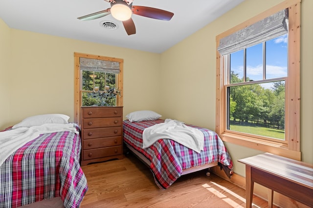 558 Pops Peak Rd, Fancy Gap, VA 24328 - bedroom with wood finished floors and a ceiling fan