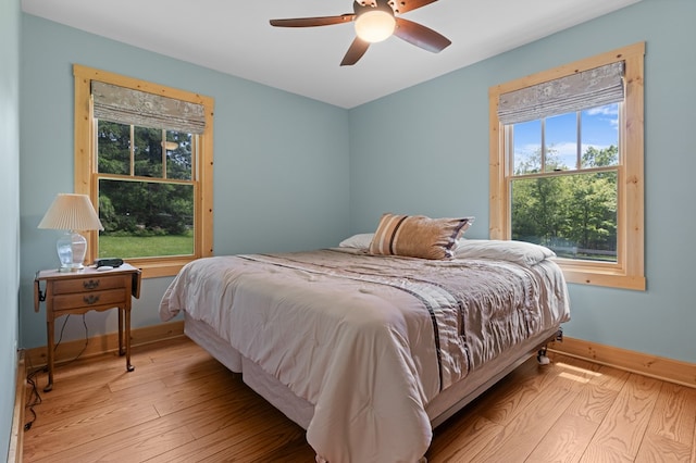 558 Pops Peak Rd, Fancy Gap, VA 24328 - bedroom featuring light wood finished floors and a ceiling fan