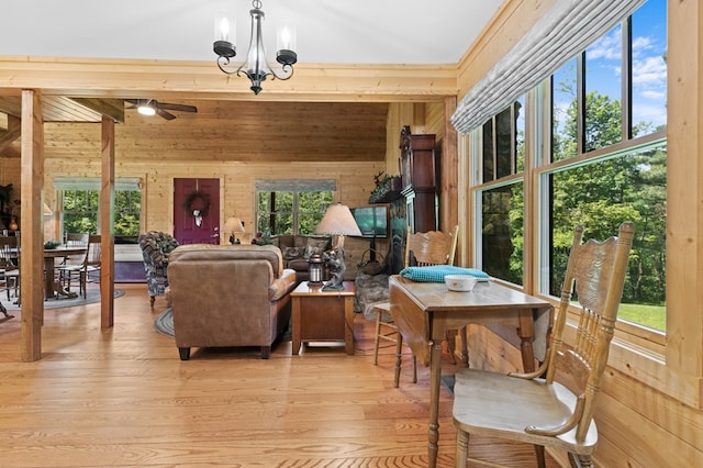 558 Pops Peak Rd, Fancy Gap, VA 24328 - living room featuring wooden walls, light wood finished floors, and ceiling fan