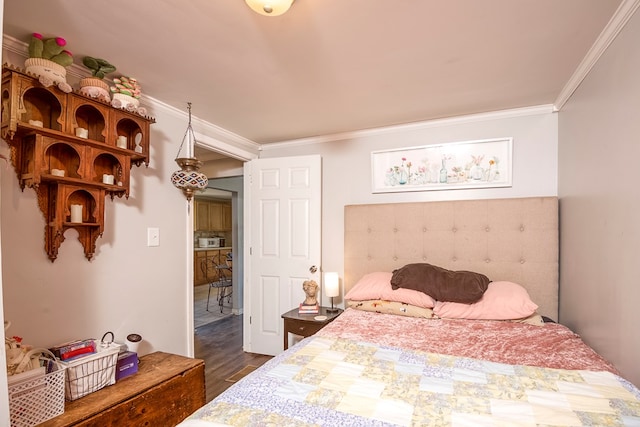 bedroom with dark wood-type flooring and ornamental molding