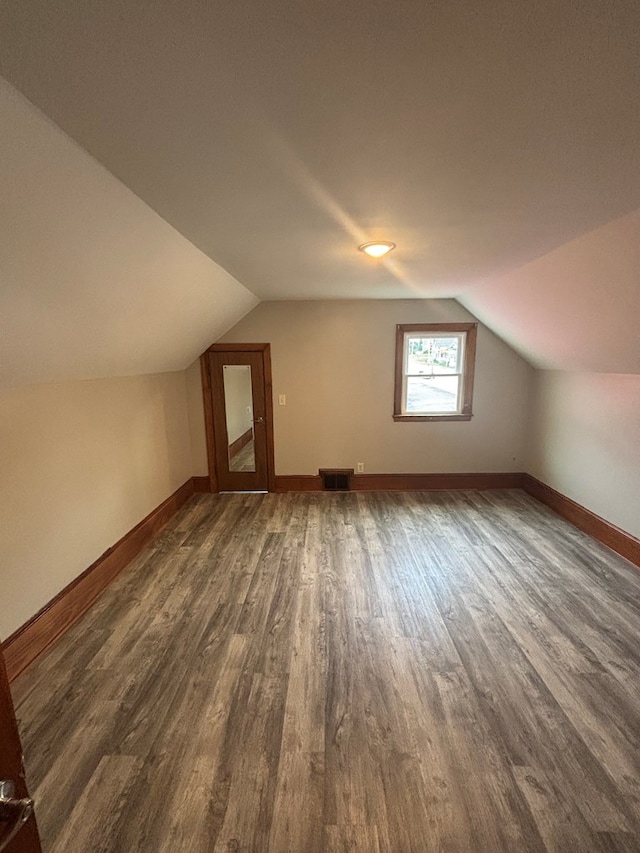 1105 N Main St, Hillsville, VA 24343 - bonus room featuring dark wood-style floors and vaulted ceiling