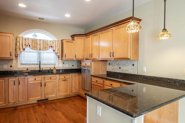 16084 Old Jonesboro Rd, Bristol, VA 24202 - kitchen featuring a peninsula, dark wood-type flooring, tasteful backsplash, and recessed lighting