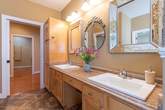 16084 Old Jonesboro Rd, Bristol, VA 24202 - bathroom featuring double vanity and baseboards