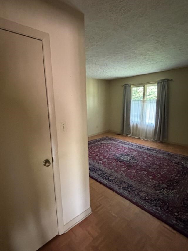 319 Bogey Dr, Abingdon, VA 24211 - empty room featuring a textured ceiling