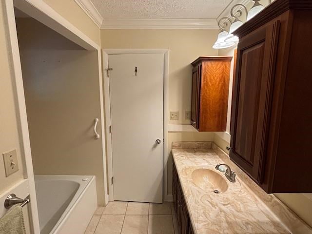 319 Bogey Dr, Abingdon, VA 24211 - bathroom featuring vanity, tile patterned floors, a tub to relax in, and a textured ceiling