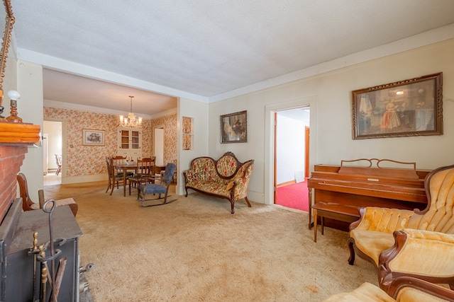 carpeted living room featuring ornamental molding, a notable chandelier, and a textured ceiling