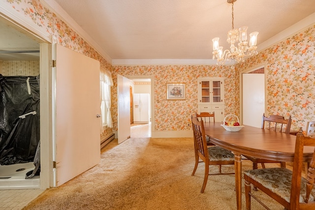 dining room featuring crown molding, light colored carpet, a chandelier, and a textured ceiling