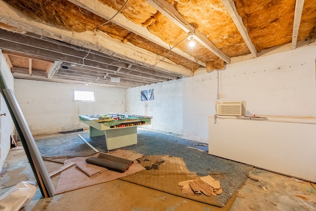 basement with an AC wall unit