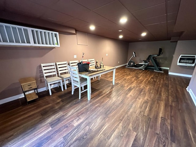 rec room featuring dark wood-style floors, baseboards, heating unit, and recessed lighting