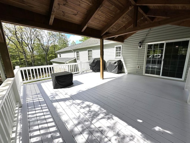 wooden deck featuring grilling area