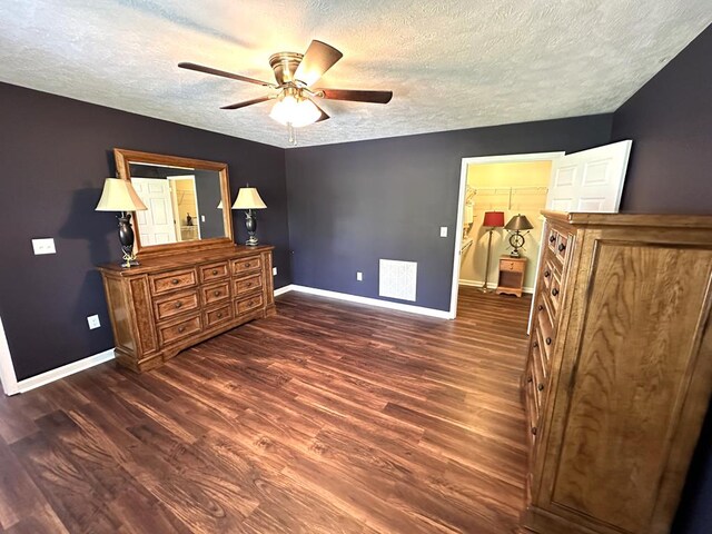 185 Laurel Dr, Fancy Gap, VA 24328 - bedroom with baseboards, a textured ceiling, wood finished floors, and a ceiling fan