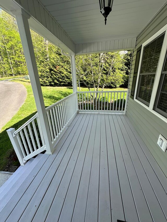 185 Laurel Dr, Fancy Gap, VA 24328 - wooden terrace featuring a porch and a yard