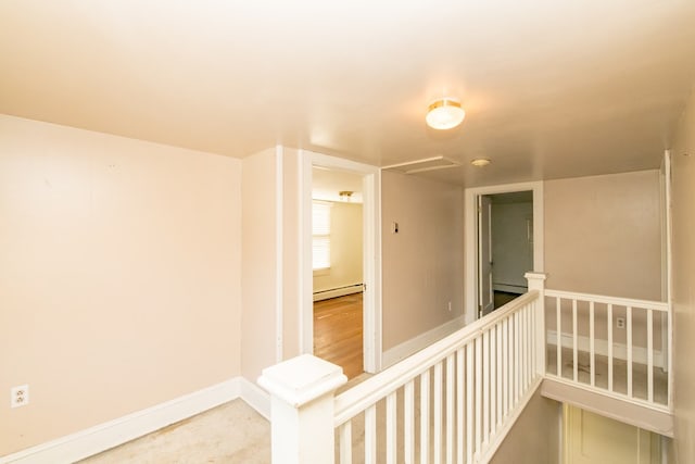 hall with baseboard heating