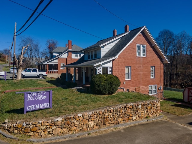 view of home's exterior featuring a lawn