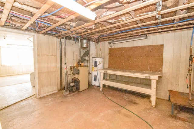 basement featuring electric water heater
