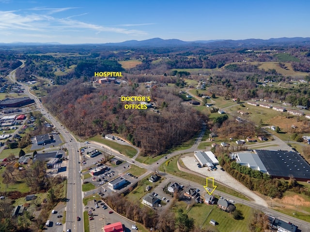 bird's eye view with a mountain view