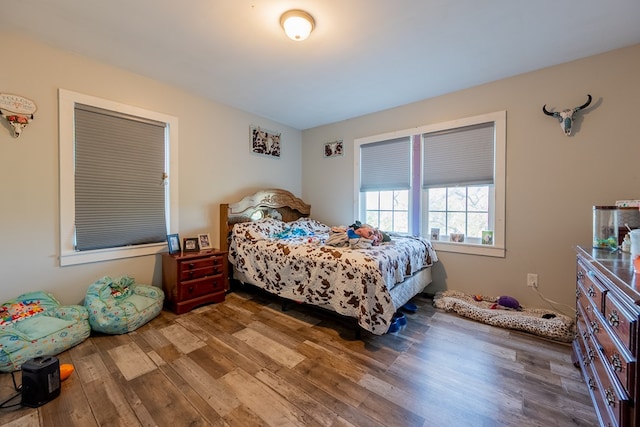 bedroom featuring hardwood / wood-style floors