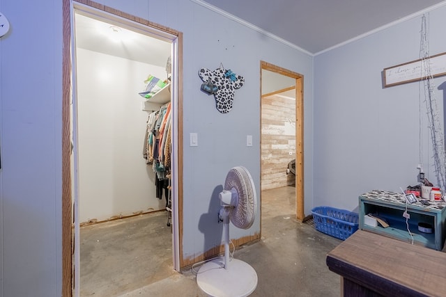 bathroom featuring crown molding and concrete floors