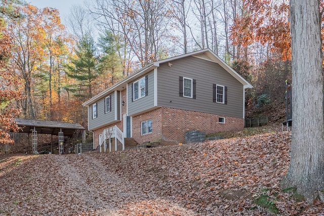 view of property exterior featuring a carport