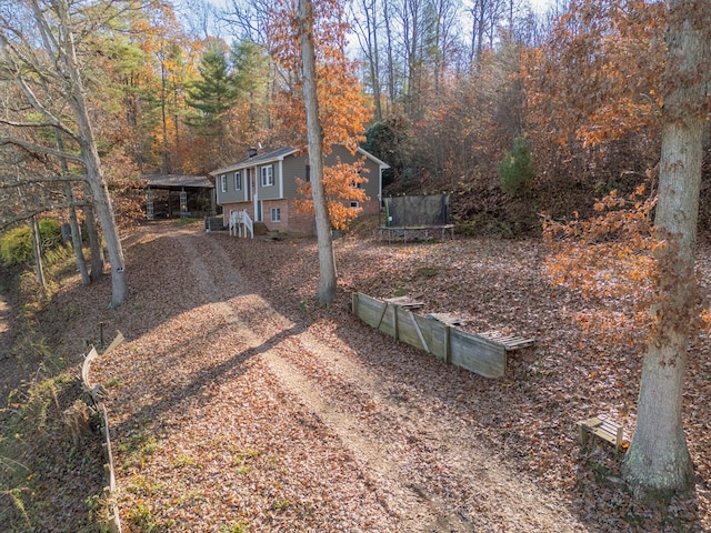 view of yard featuring a trampoline