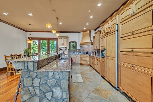 18549 Landridge Way, Abingdon, VA 24211 - kitchen featuring crown molding, custom range hood, a breakfast bar area, recessed lighting, and light stone countertops