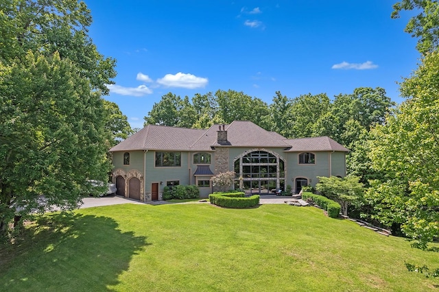 18549 Landridge Way, Abingdon, VA 24211 - rear view of property with a garage, a yard, a chimney, and driveway