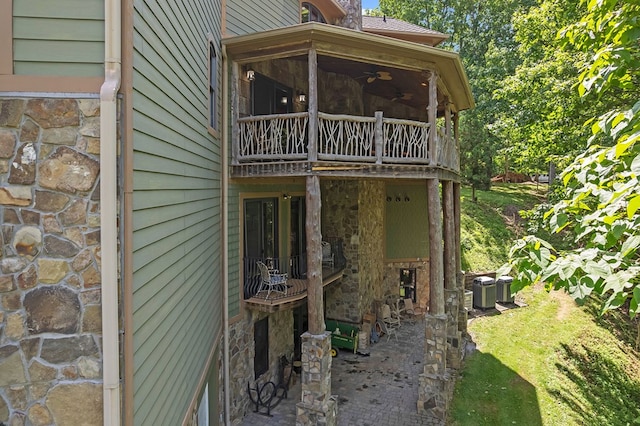 18549 Landridge Way, Abingdon, VA 24211 - view of side of property featuring stone siding, a balcony, and ceiling fan