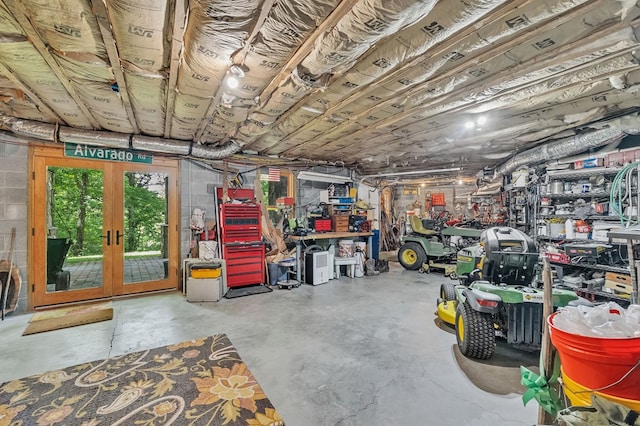 18549 Landridge Way, Abingdon, VA 24211 - garage with french doors and a workshop area