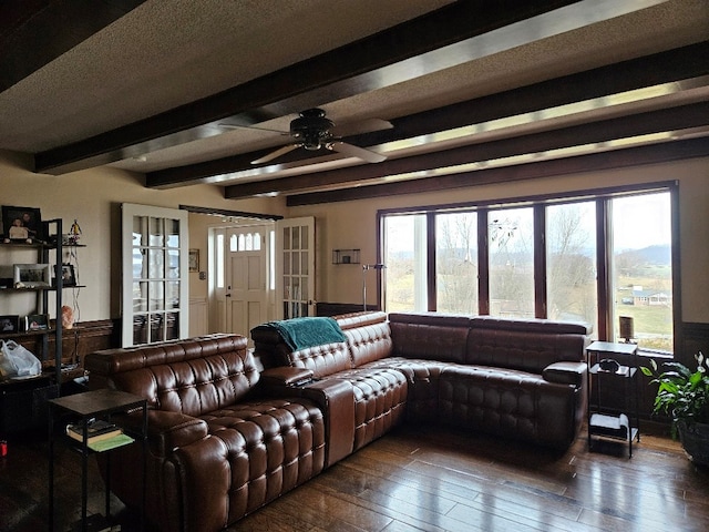 419 Tanglewood Dr, Glade Spring, VA 24340 - living area featuring a ceiling fan, beamed ceiling, and hardwood / wood-style flooring
