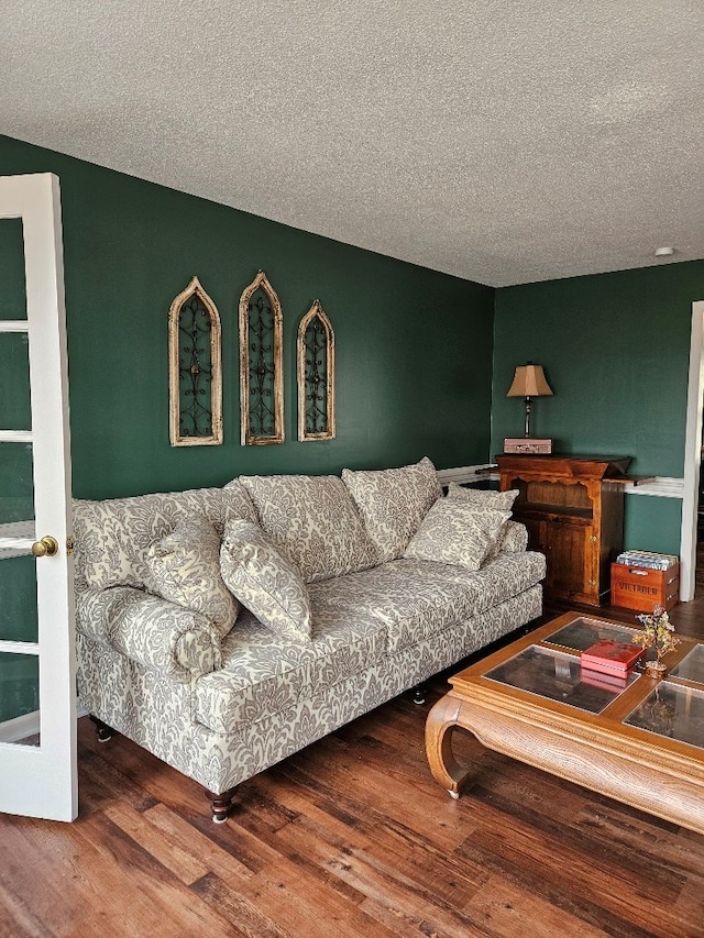 419 Tanglewood Dr, Glade Spring, VA 24340 - living area featuring a textured ceiling and wood finished floors