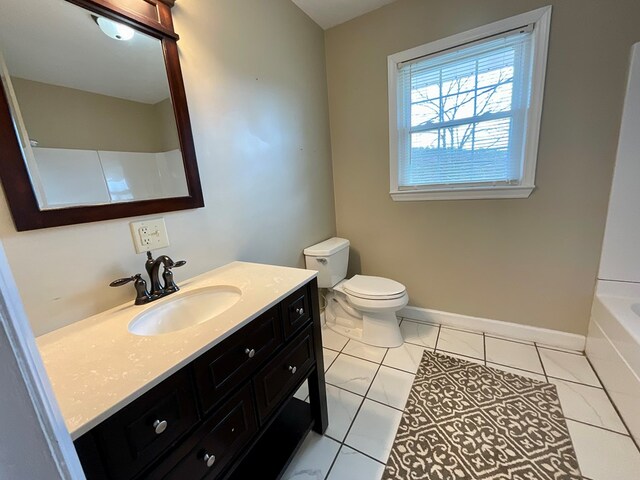 full bathroom with a shower, vanity, toilet, a washtub, and baseboards